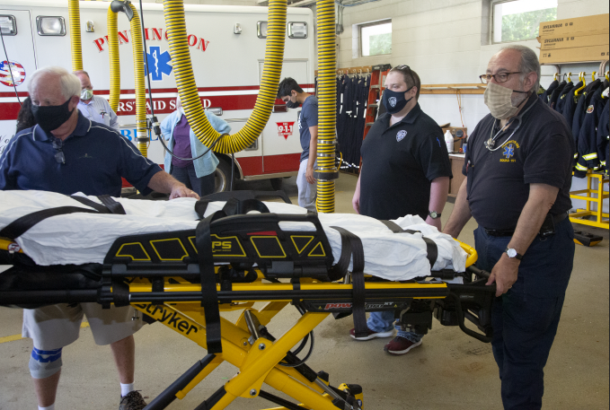 members practicing with Stryker Power-Pro XT stretcher